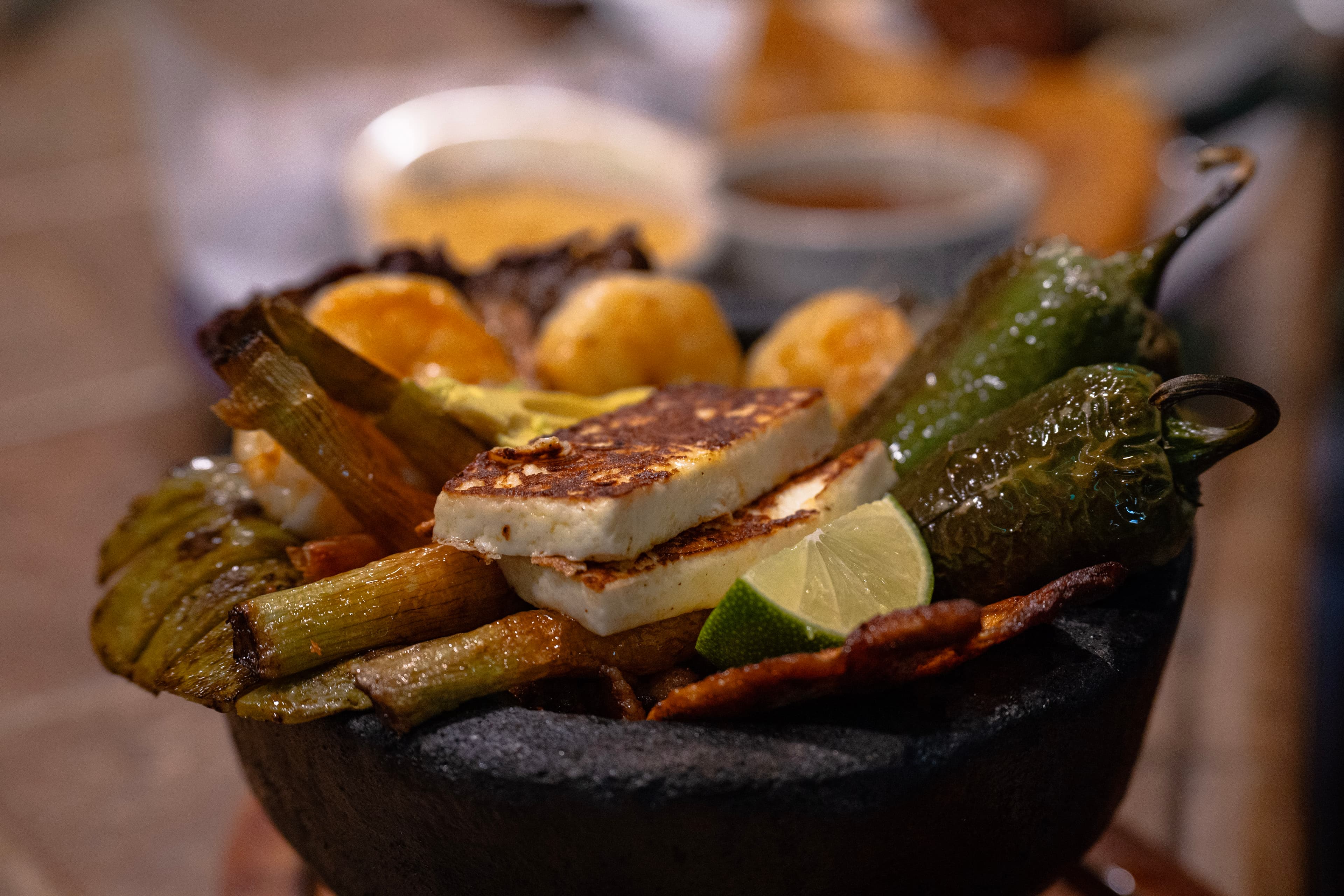 Grilled green onions and cheese with lime